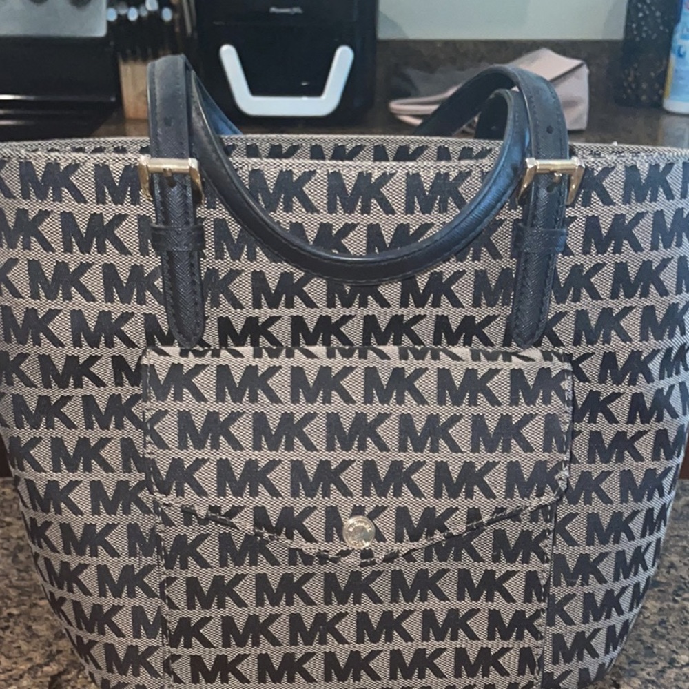 Brown and black Michael kors purse